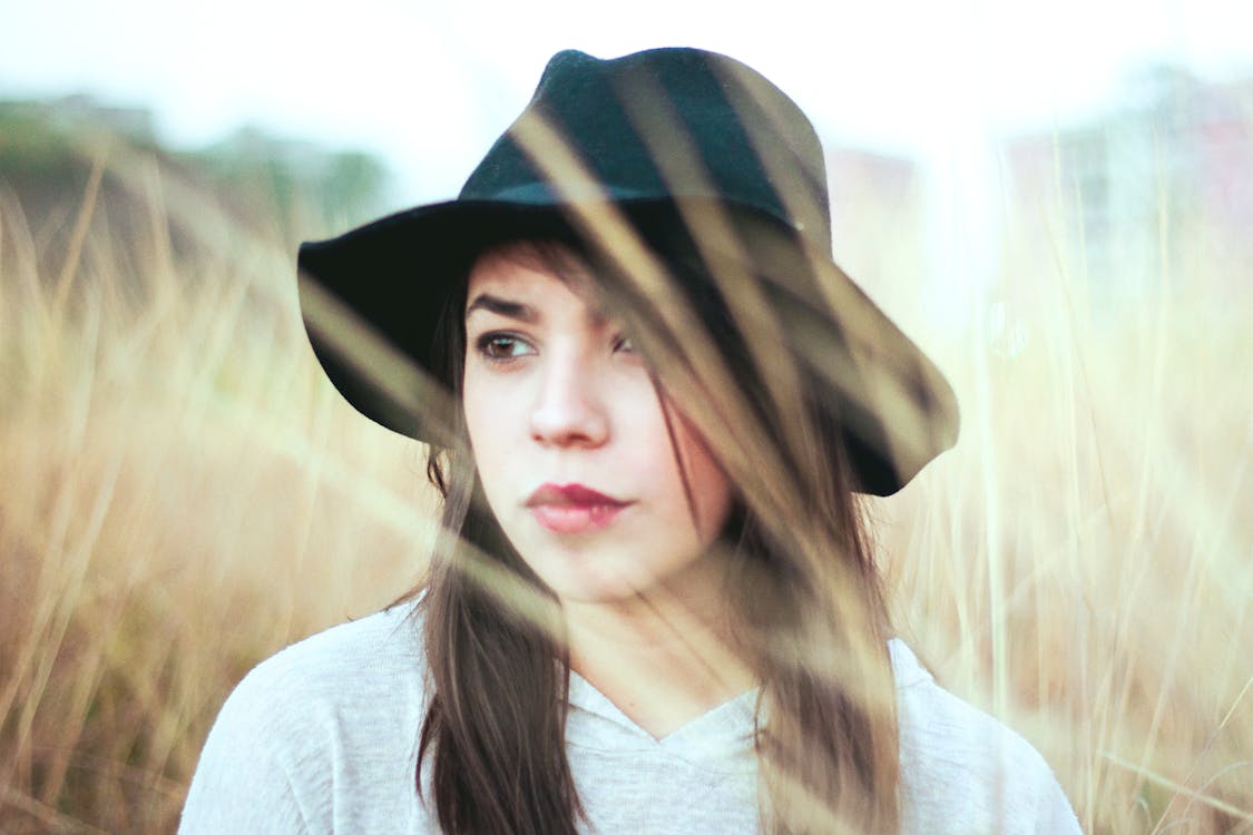 Woman Wearing Black Hat