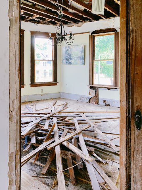 Wooden Planks on the Floor in a House during Demolition