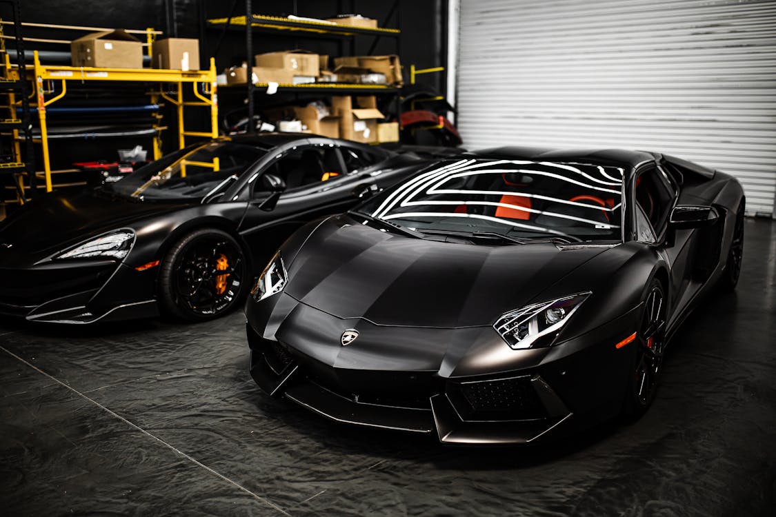 Black Cars Parked in a Garage · Free Stock Photo