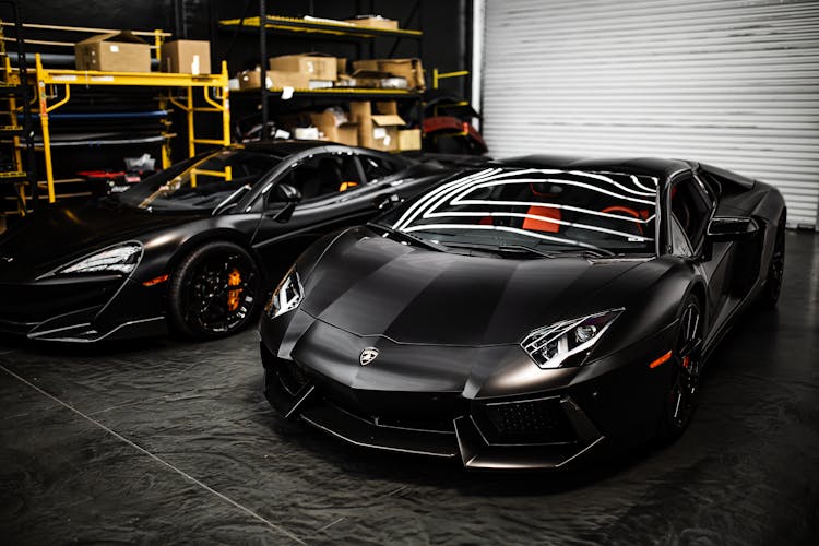 Black Cars Parked In A Garage