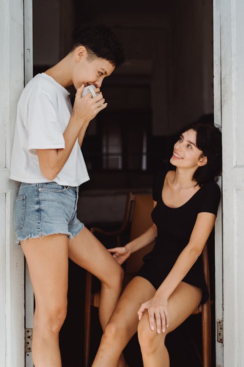 Free Two Women Looking at Each Other Stock Photo
