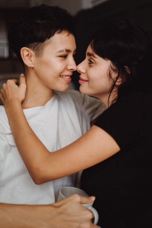 Free A tender moment between a loving couple embracing with joy and warmth. Stock Photo