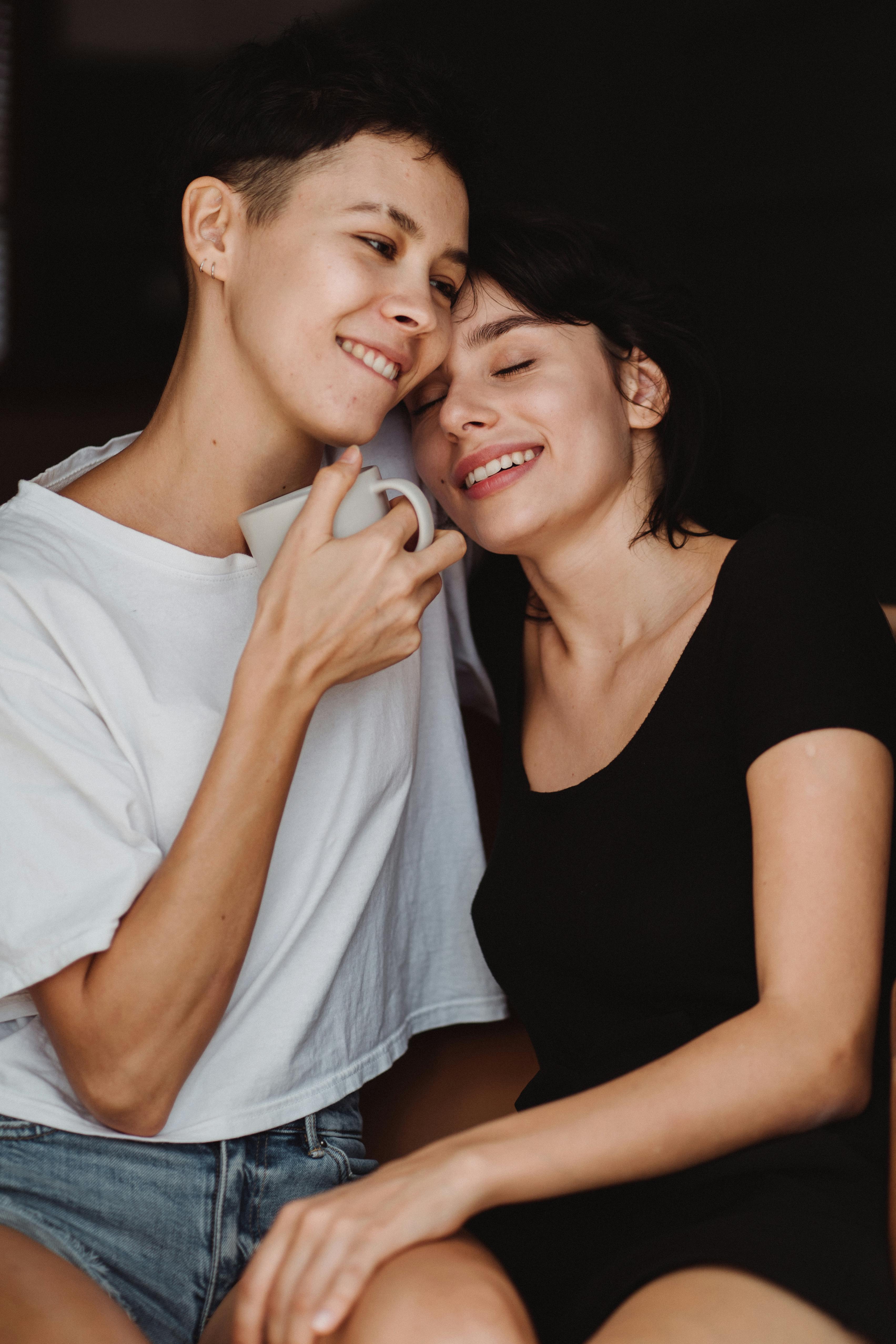 two women being affectionate