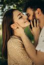 Man and Woman Kissing Each Other
