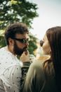 Man in White Dress Shirt Wearing Black Sunglasses