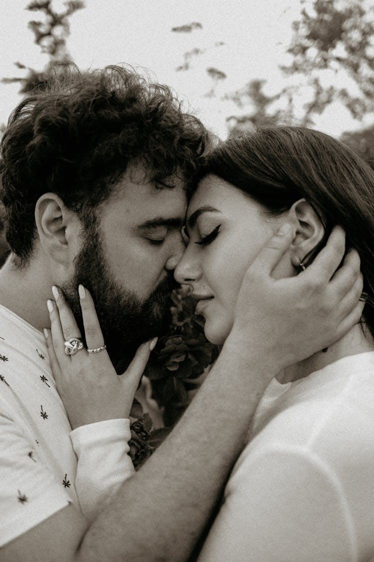 Man And Woman Kissing Each Other