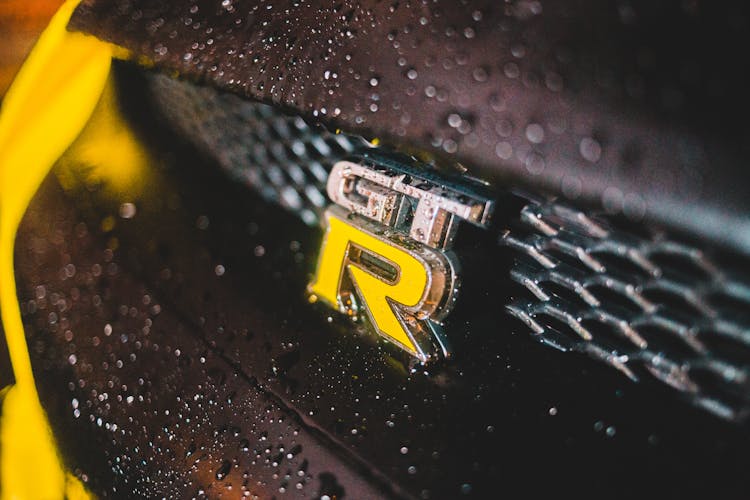 Yellow Detail On Wet Modern Car