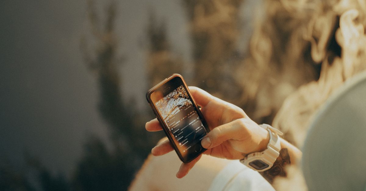 A Person Using His Smartphone · Free Stock Photo