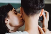 Man Kissing Womans Cheek