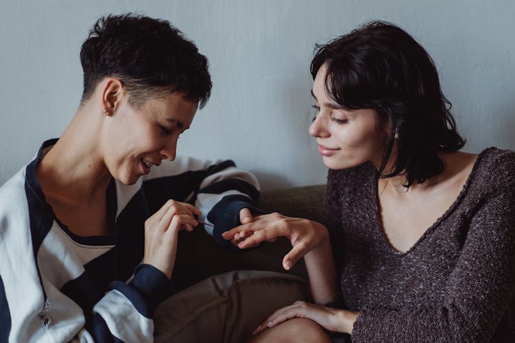 Women Painting Nails