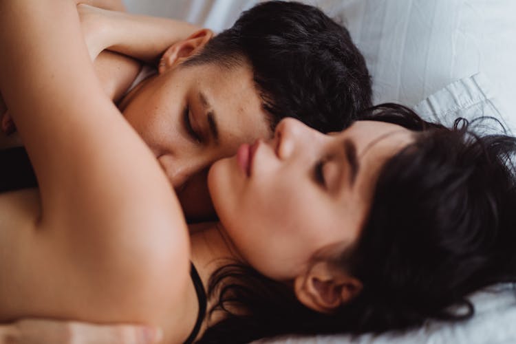 Close Up Of Two Women Sleeping Together