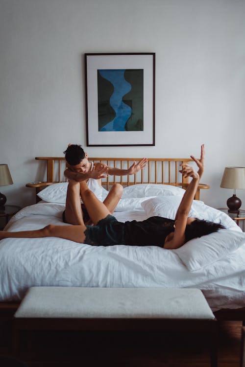 Free Two Women in Bed Having Fun Stock Photo