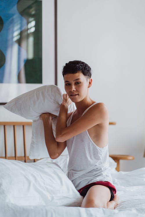 Free Woman Holding a Pillow Stock Photo