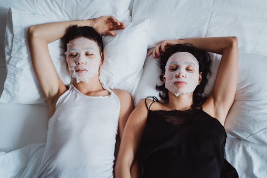 Two individuals relaxing with facial masks, promoting skincare and tranquility.