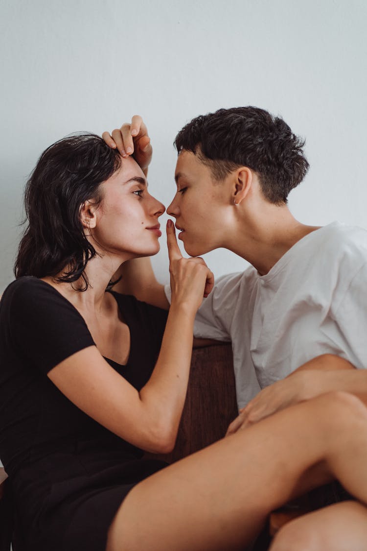 Portrait Of Woman Leaning In For Kiss