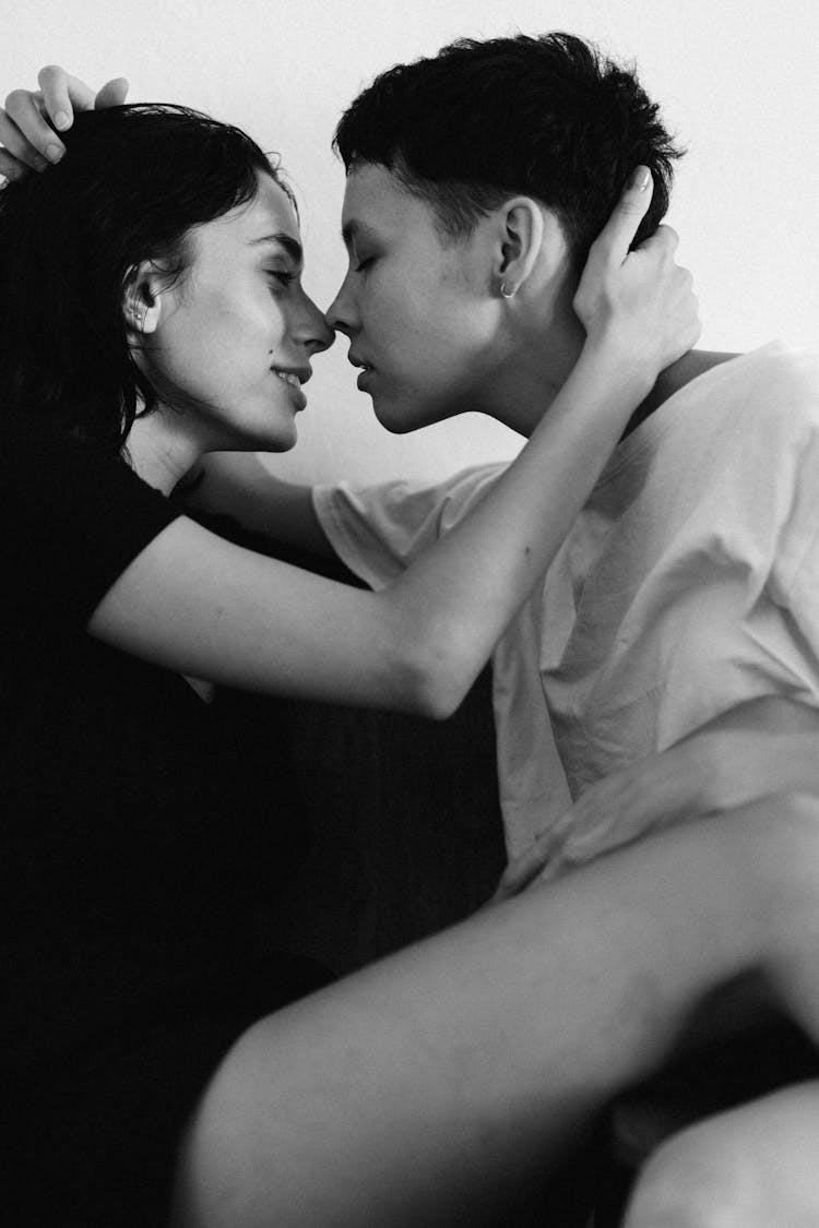 Black And White Photo Of Couple Kissing