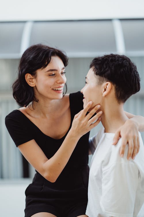 Free A Couple Smiling at each other Stock Photo
