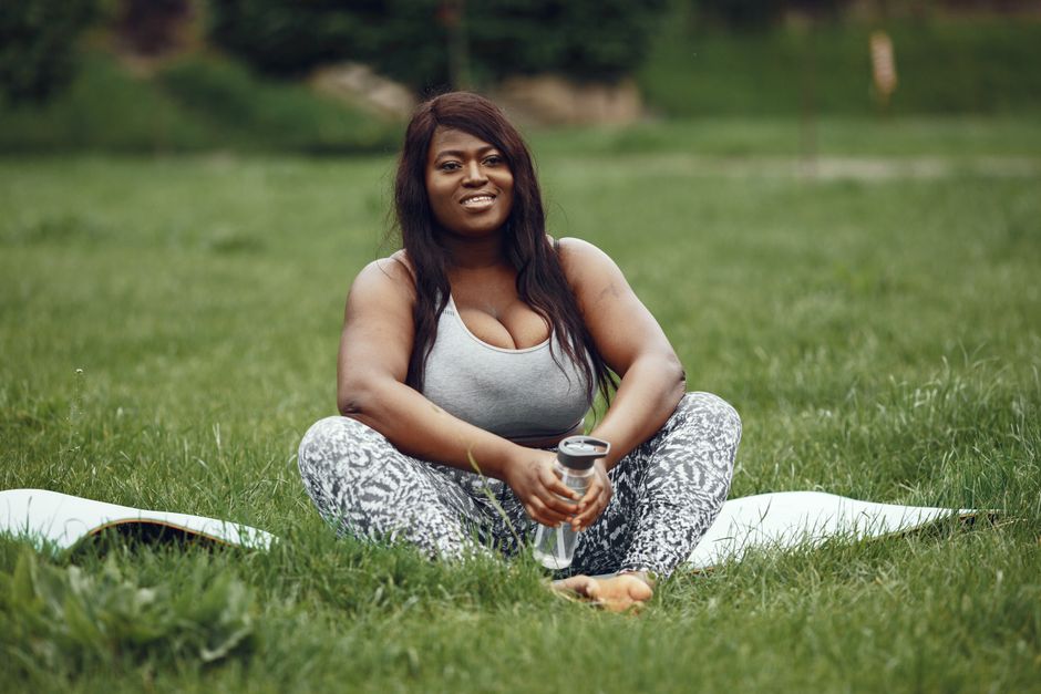 A person smiling and feeling energized after a morning workout - quick morning workout for energy A person smiling and feeling energized after a morning workout - quick morning workout for energy