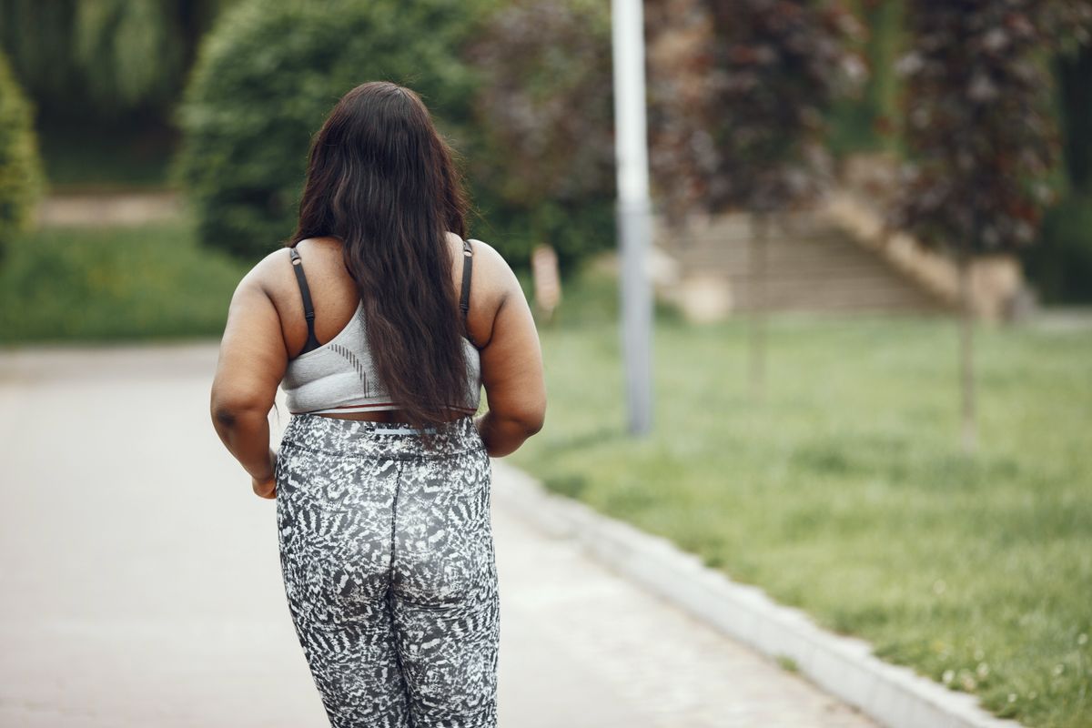 Runner wearing activewear in an outdoor park