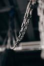 Silver Chain Link on Black Metal Bar