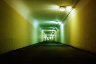 Empty Hallway With Lights Turned on in the Middle