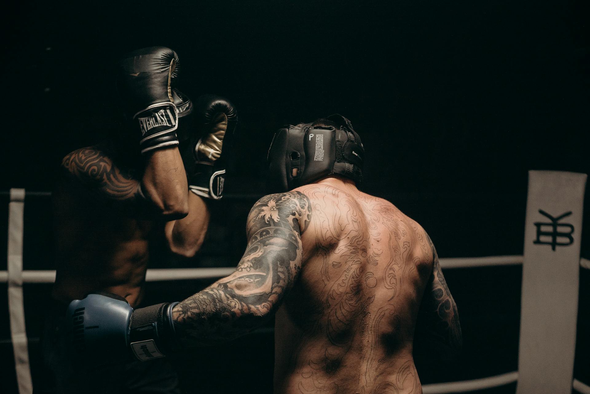 Man in Black Boxing Gloves