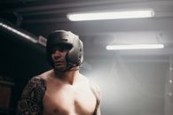 Topless Man Wearing Black and White Helmet