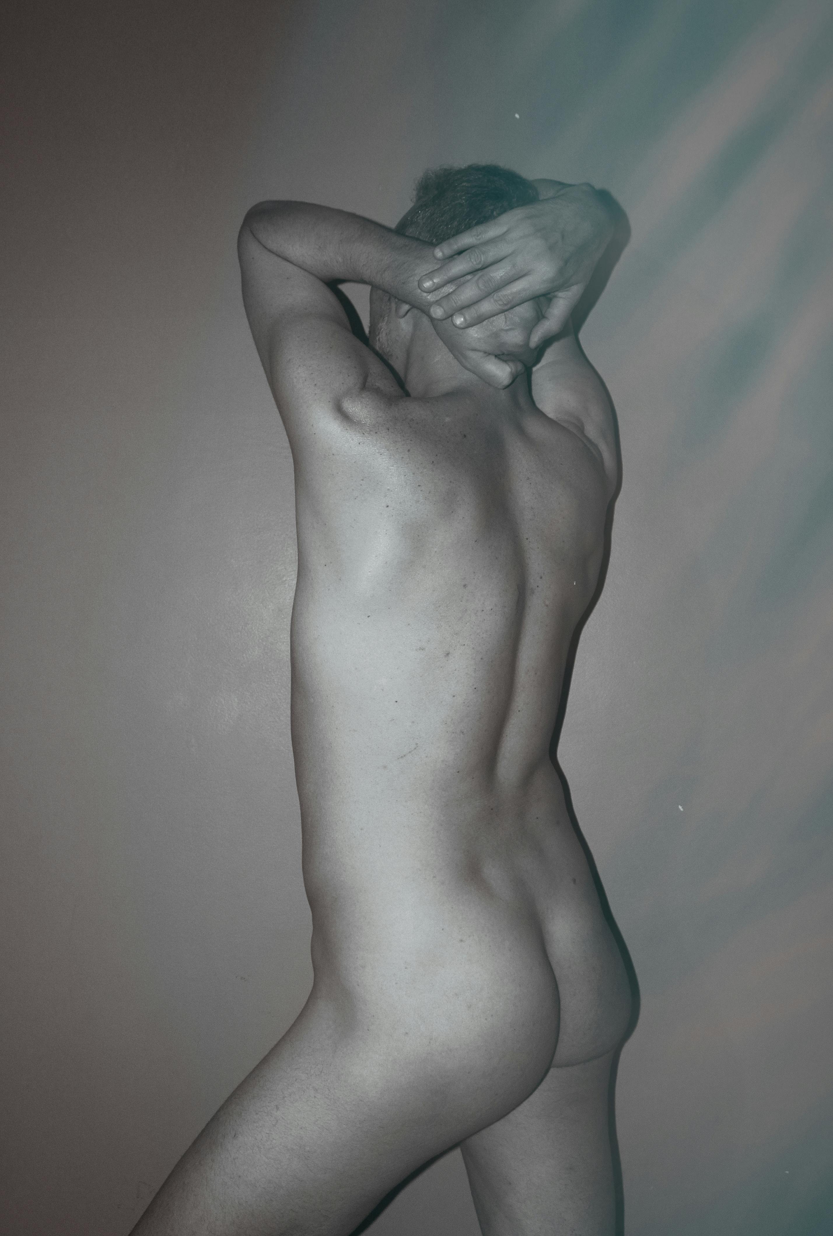 MMA coach guiding a fighter inside a gym