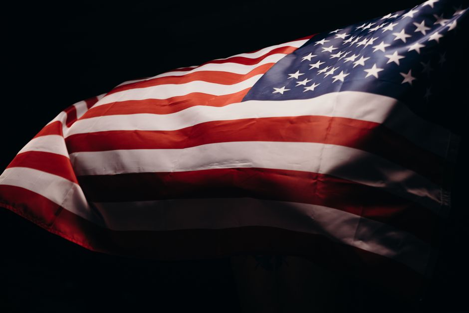 Close-up of a wind-blown American flag symbolizing freedom and patriotism.