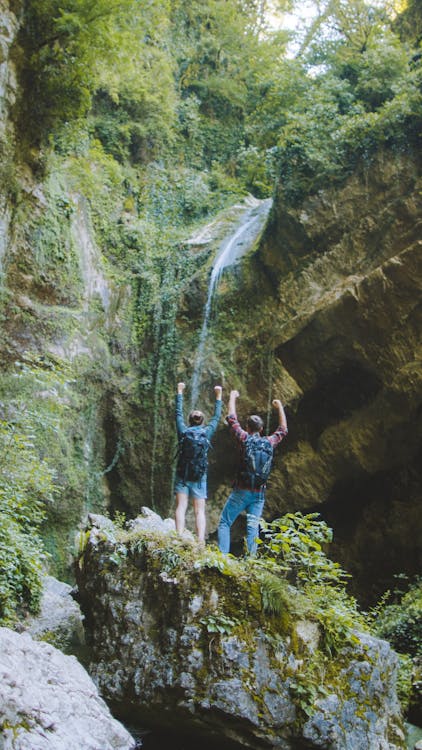 Couple Standing on Rock