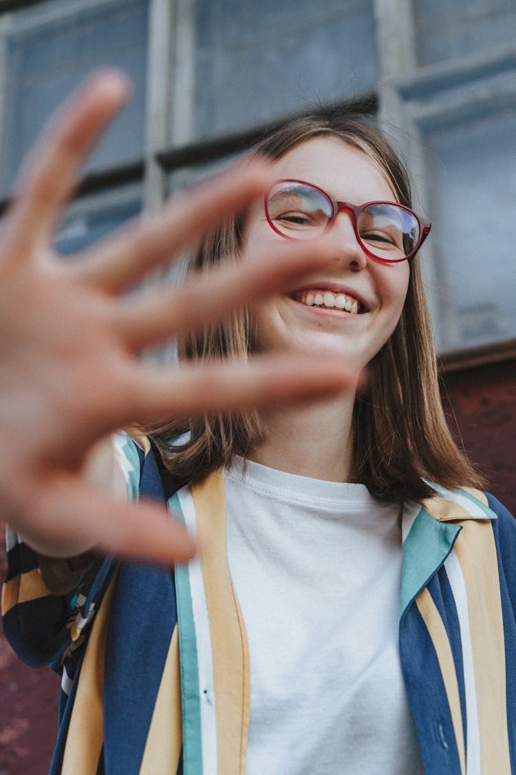 Woman Wearing Red Framed Eyeglasses