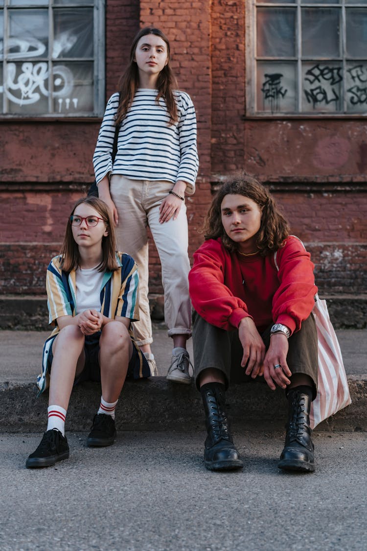 Friends Hanging Out On The Curb