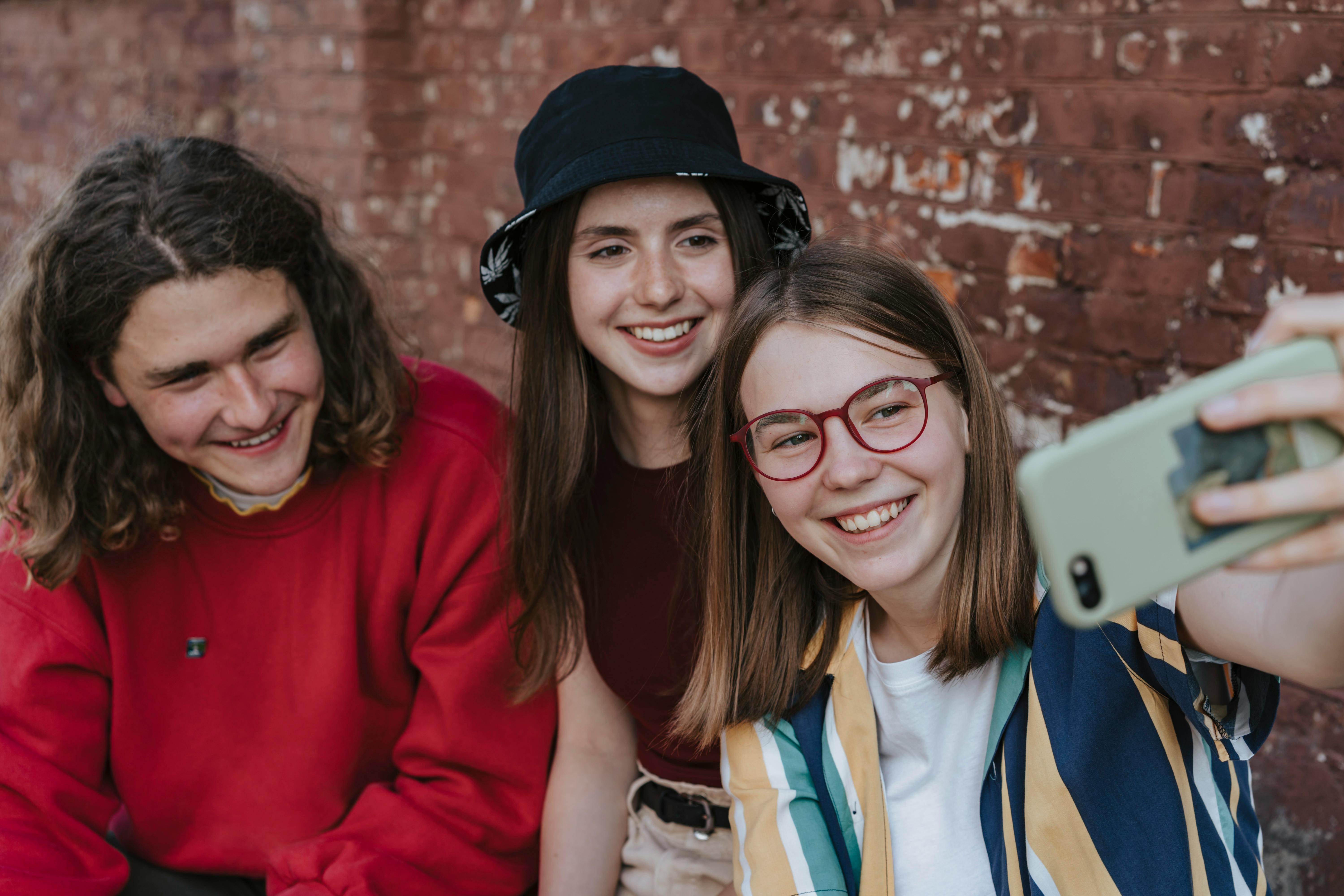 teenagers taking a groupfie