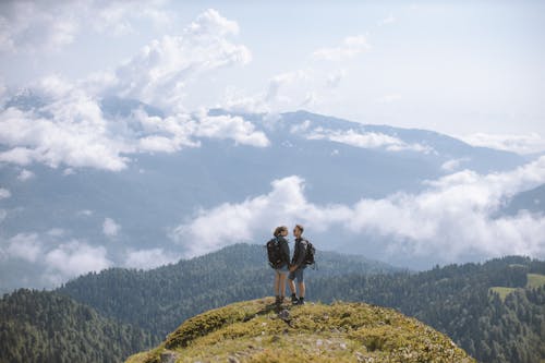 A Couple on Top of a Mountain 