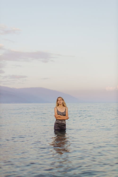 Woman Standing on Sea