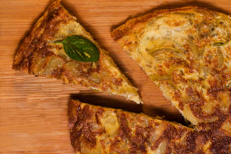 Overhead Shot Of A Slice Of Spanish Omelet