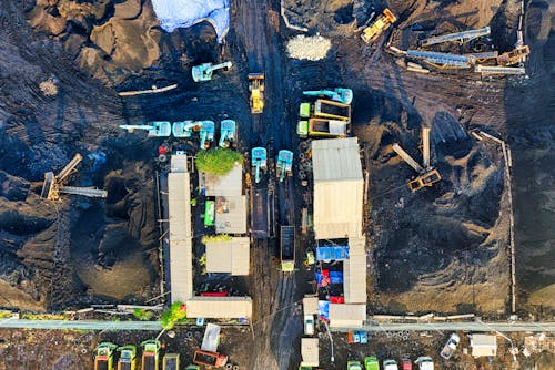 Top View Shot of Trucks on a Construction Site