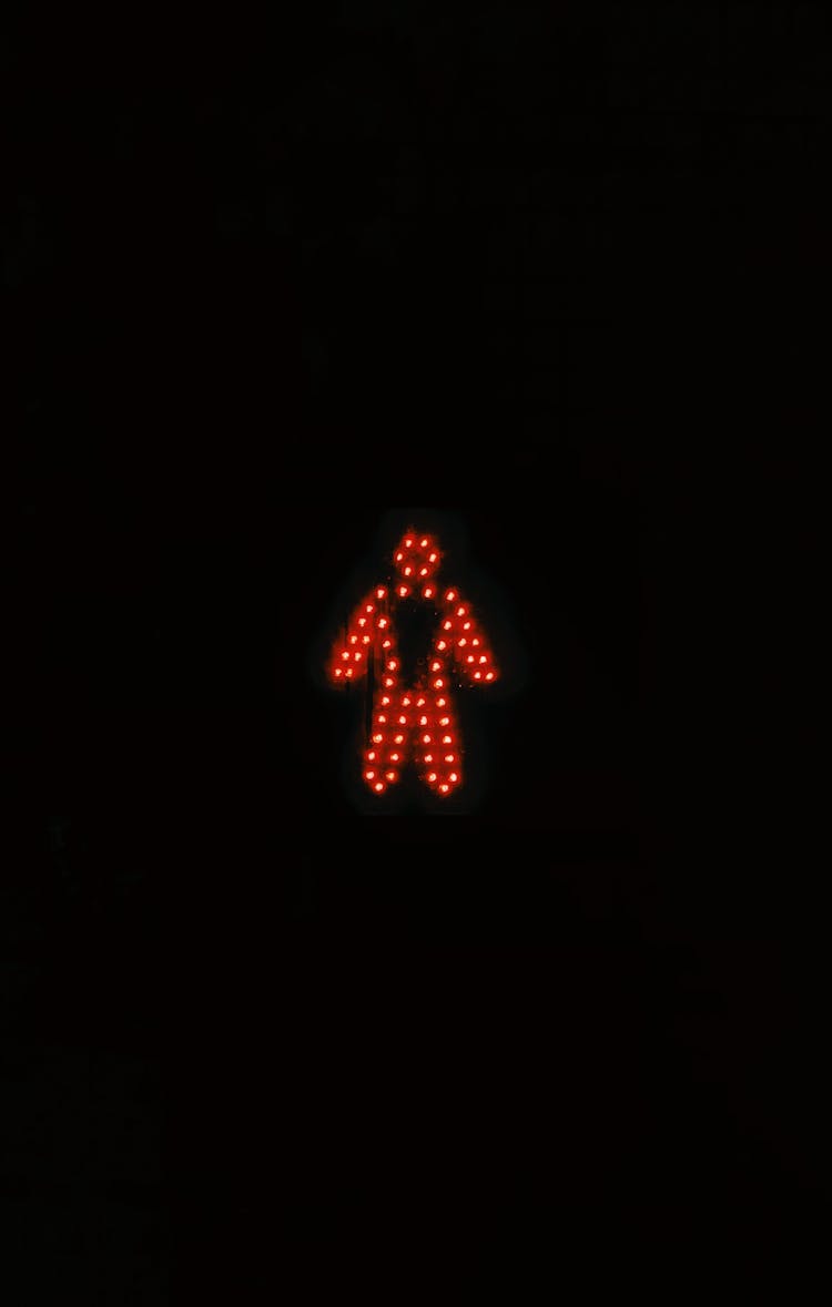 Red Traffic Light In Dark Time