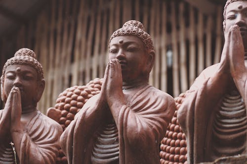 Brown Concrete Buddha Statues