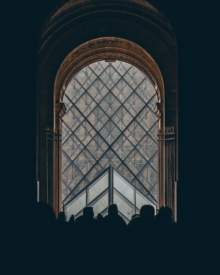 Silhouette Of People Inside A Museum