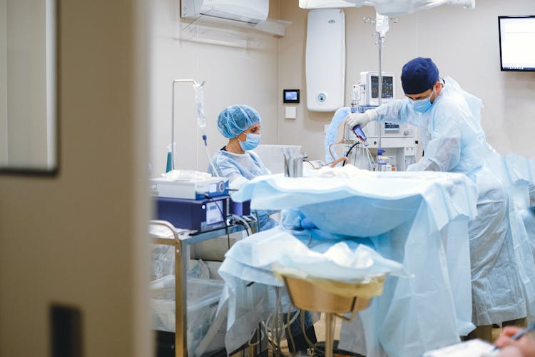 Nurse And Surgeon In Operating Room