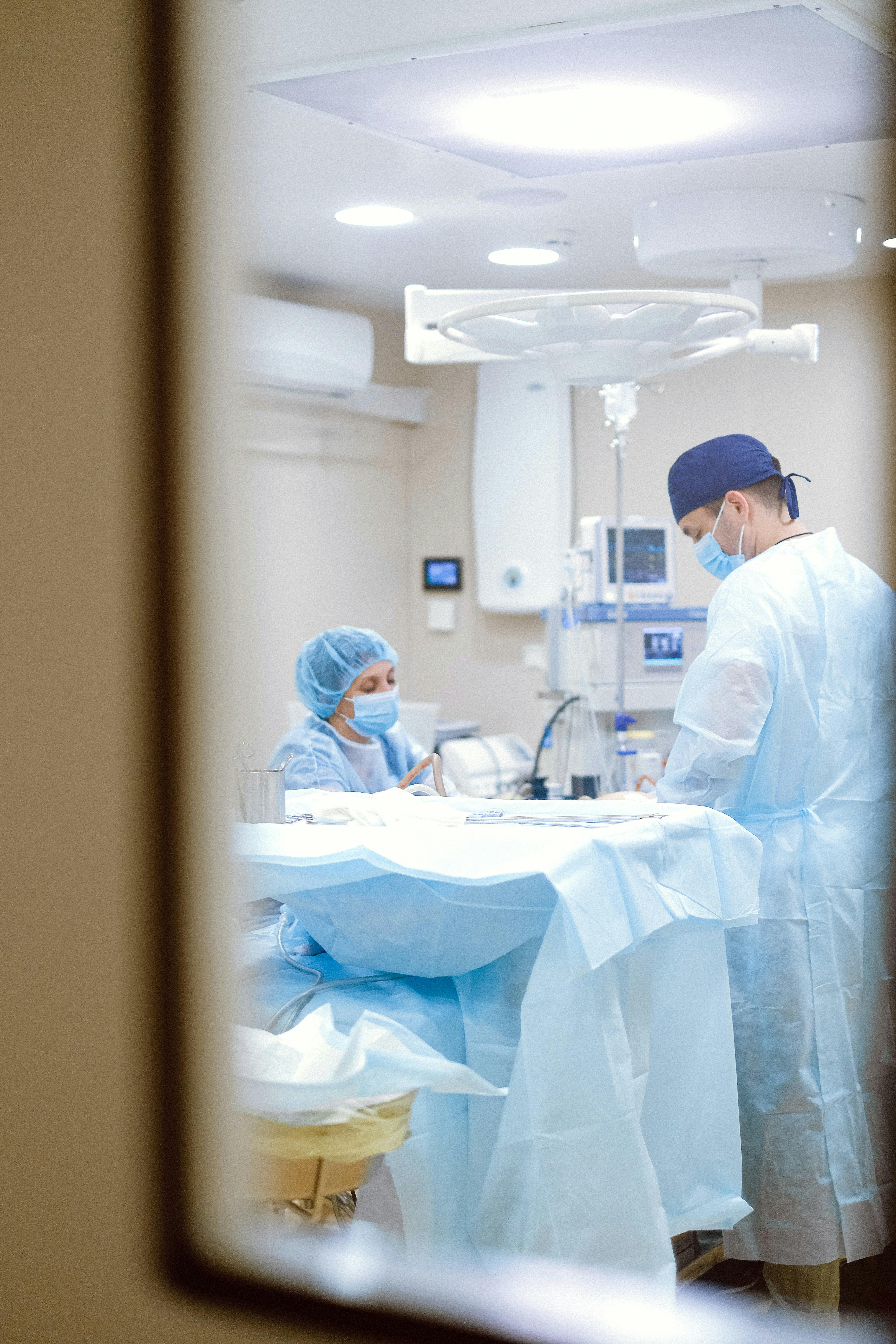 peeking through an operating rooms window