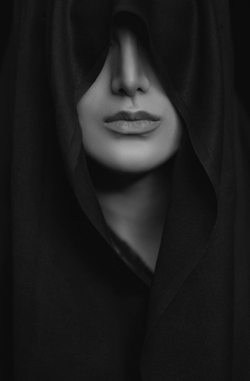 Free Black and white portrait capturing a veiled woman, focusing on lips and nose for an enigmatic feel. Stock Photo