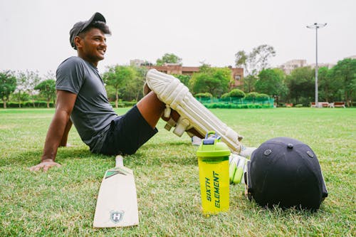 Foto profissional grátis de atleta, bastão de cricket, copo