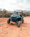 Green and Black Jeep Wrangler on Brown Dirt Road