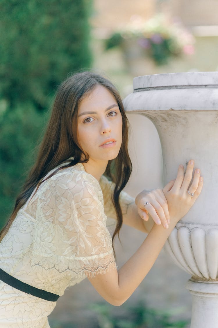 A Woman In Beige Dress