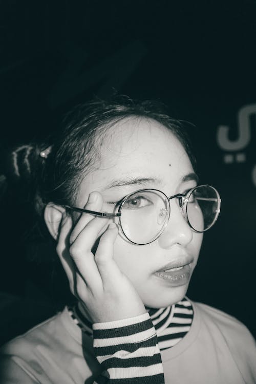 Free Grayscale Photo of Woman Wearing Eyeglasses Stock Photo
