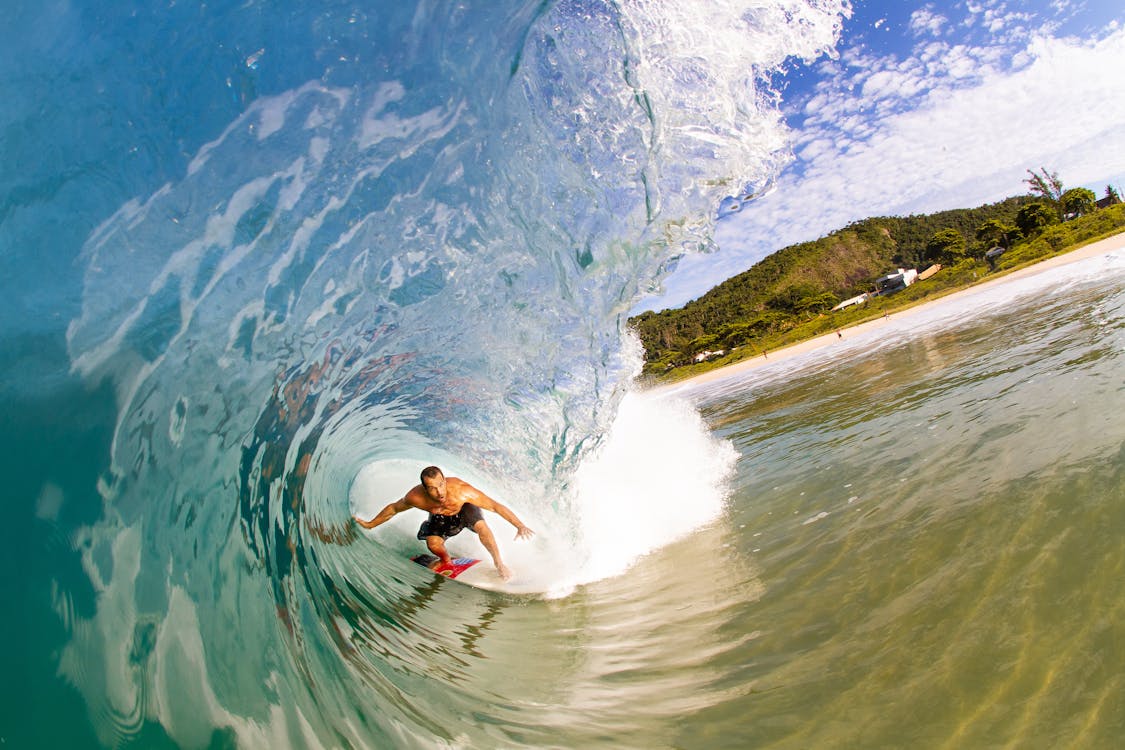 Man Surfing Waves