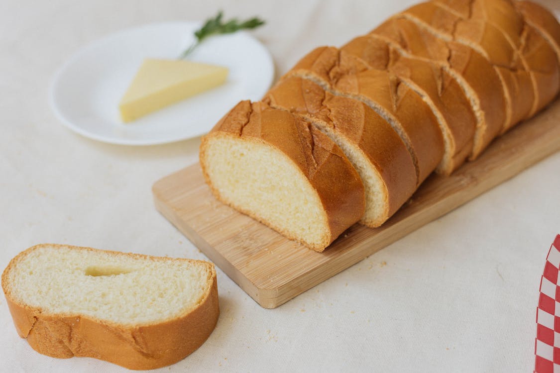 Close-up of Fresh Cut Bread on Board