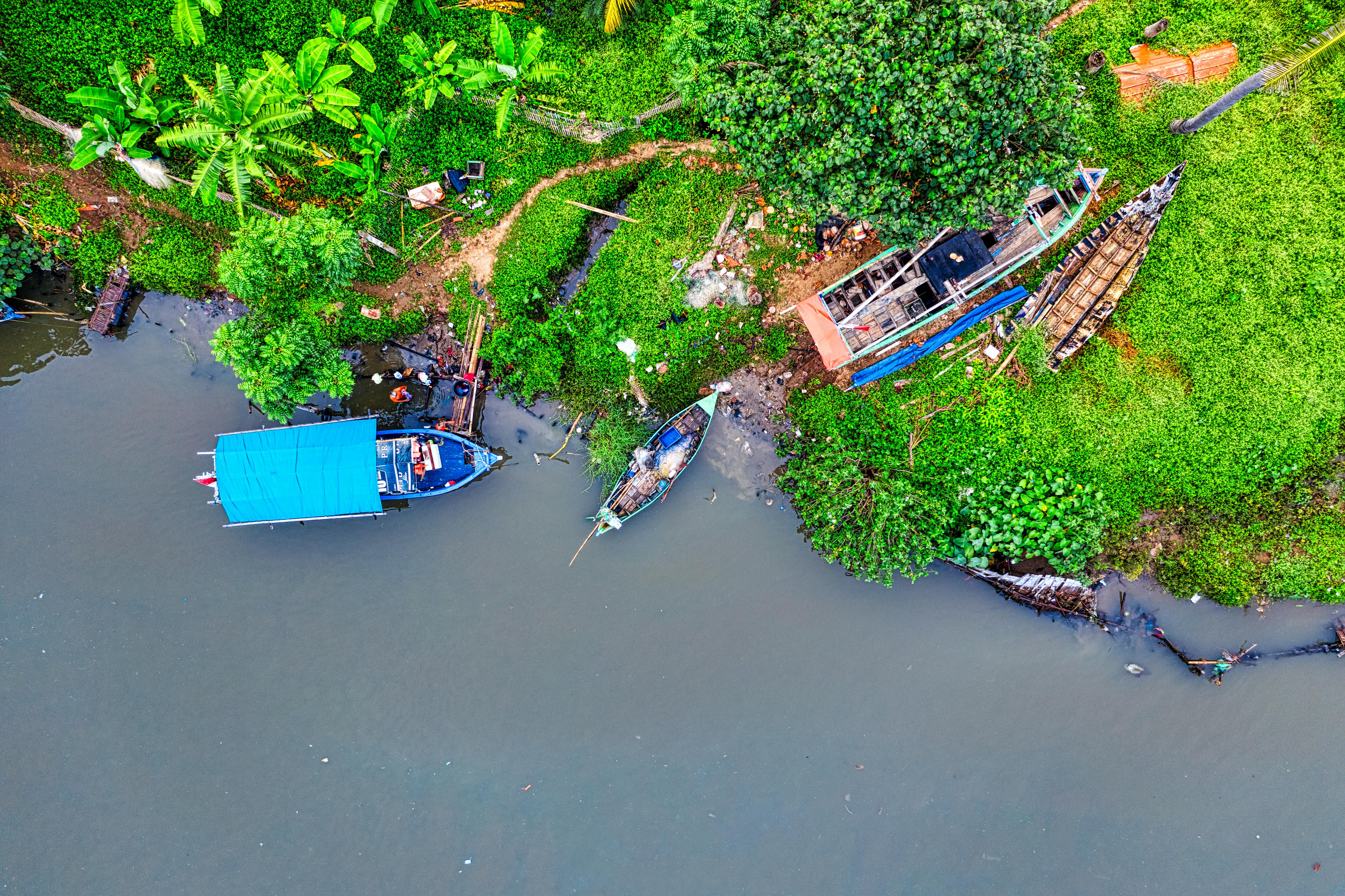 blue and brown boat on water